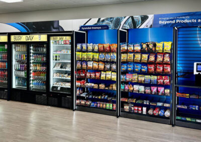 Deluxe micro market display for Buffalo Rock with retail beverage and snack coolers