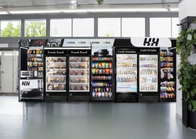 Deluxe micro market setup for HH workplace with drink coolers and retail shelves