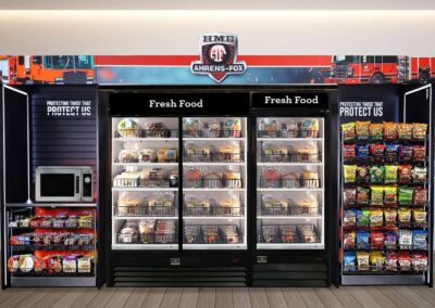 Deluxe vending fixture with firehouse branding at HME Ahrens Fox manufacturing plant