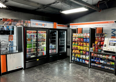 Deluxe micro market fixture at Mersen with modular shelving and brand graphics