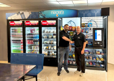 Deluxe vending fixture for Niagara Bottling with drink coolers and snack modules