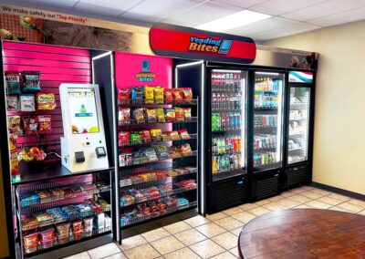 Deluxe micro market by Vending Bites with full branding, shelving, and coolers