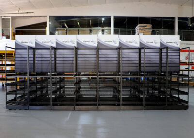 Lock N Load vending unit for large breakroom spaces with black metal shelving