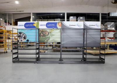 Lock N Load micro market display with USANA wellness-themed branding and custom wraps