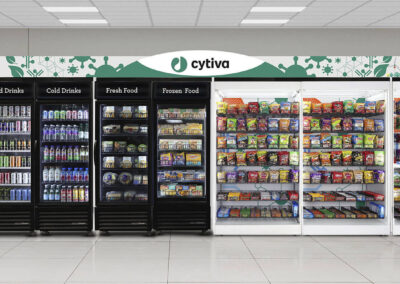 Premier micro market at Cytiva featuring retail snack walls and branded refrigerator units
