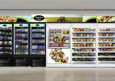 Premier micro market display at Taylor Farms with branded snack shelves and drink area