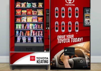 Toyota-branded vending machines installed at Keating Toyota with red wrap graphics