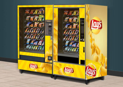 Lay’s-branded vending machines with yellow graphics and product merchandising
