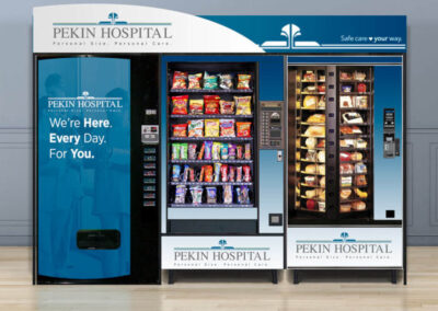Branded vending wall installed at Pekin Hospital with snack and drink options