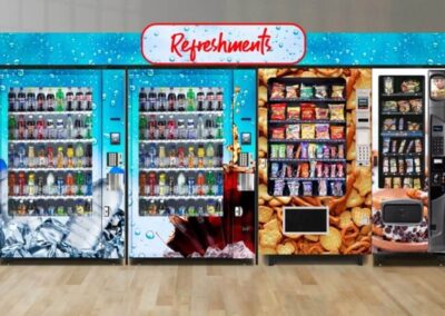 Retail-style vending wall featuring drinks, snacks, and custom signage