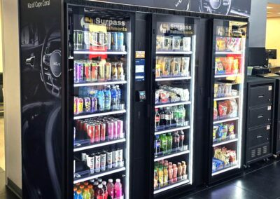Magnetic header cooler bank for Kia of Cape Coral with full-wrap branding, great for micro markets, vending machines, and AI coolers
